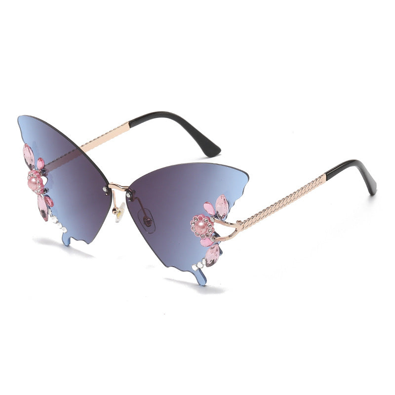 Gafas de sol de PC sin borde de diamante de forma de mariposa al por mayor